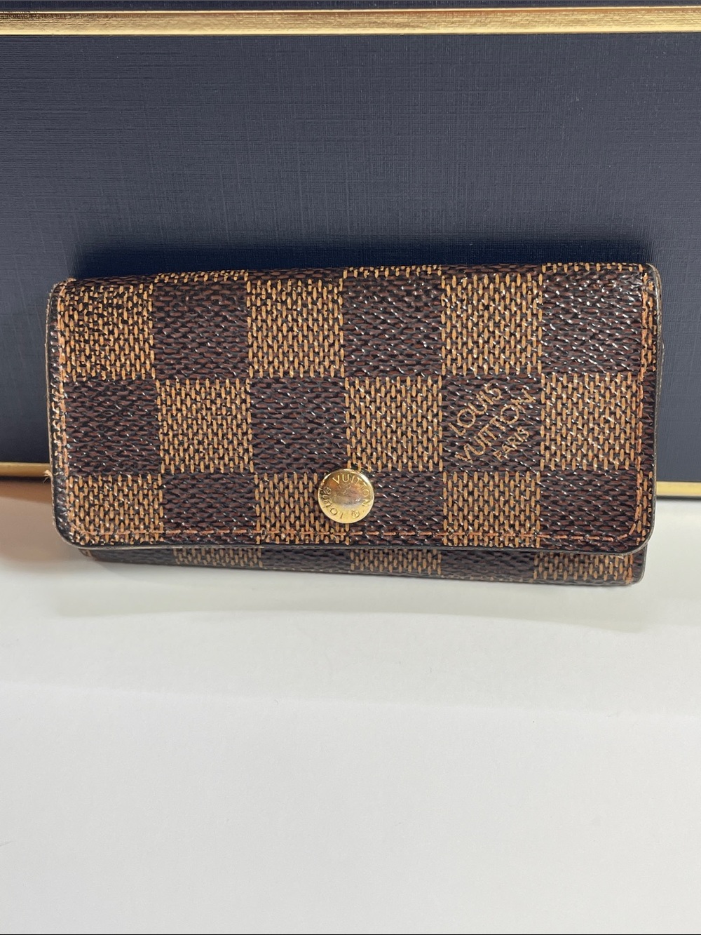 Louis Vuitton Authentic Brown Damier Ebene Checkered Key Holder with Gold Snap